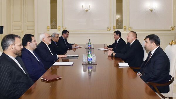 Президент Азербайджана Ильхам Алиев на встрече с министром иностранных дел Ирана Мохаммедом Джавадом Зарифом - Sputnik Азербайджан