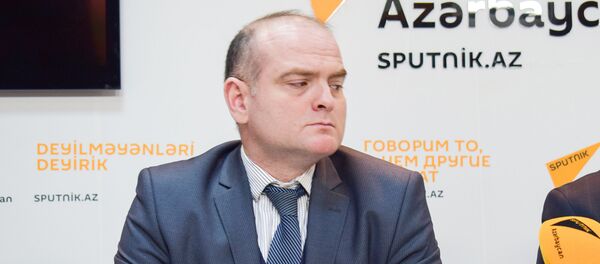 Профессор Государственного экономического университета Азербайджана Эльшад Мамедов Профессор Государственного экономического университета Азербайджана Эльшад Мамедов - Sputnik Азербайджан