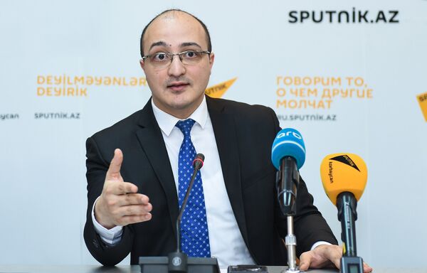 Политологи Заур Мамедов и Заур Ибрагимли подвели политические итоги уходящего года в мультимедийном пресс-центре Sputnik Азербайджан - Sputnik Азербайджан