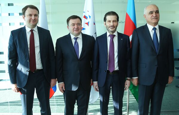 В церемонии открытия приняли участие министр экономического развития РФ Максим Орешкин, руководитель группы РЭЦ Петр Фрадков, руководитель представительства РЭЦ в Азербайджане Нури Гулиев и министр экономики Азербайджана Шахин Мустафаев В церемонии открытия приняли участие министр экономического развития РФ Максим Орешкин, руководитель группы РЭЦ Петр Фрадков, руководитель представительства РЭЦ в Азербайджане Нури Гулиев и министр экономики Азербайджана Шахин Мустафаев - Sputnik Азербайджан