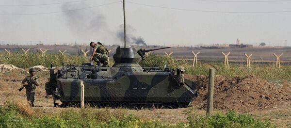Турецкие военнослужащие вблизи Турецко-сирийской границы, фото из архива Турецкие военнослужащие вблизи Турецко-сирийской границы, фото из архива - Sputnik Азербайджан