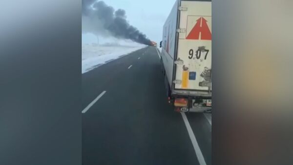 52 человека сгорели в автобусе в Казахстане - Sputnik Азербайджан