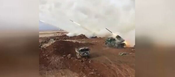 Турецкие военные обстреляли позиции сирийских курдов в Африне Турецкие военные обстреляли позиции сирийских курдов в Африне - Sputnik Азербайджан