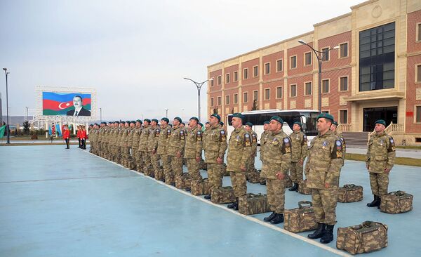 Группа азербайджанских миротворцев вернулась из Афганистана Группа азербайджанских миротворцев вернулась из Афганистана - Sputnik Азербайджан
