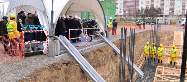 Церемония закладки фундамента нового учебного Центра профессиональной подготовки Церемония закладки фундамента нового учебного Центра профессиональной подготовки - Sputnik Азербайджан