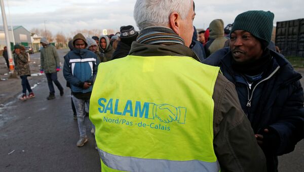 Мигранты в городе Кале, Франция - Sputnik Азербайджан