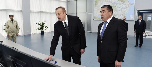 Президент Ильхам Алиев в Мингячевирской ГЭС, введенной в эксплуатацию после реконструкции Президент Ильхам Алиев в Мингячевирской ГЭС, введенной в эксплуатацию после реконструкции - Sputnik Азербайджан
