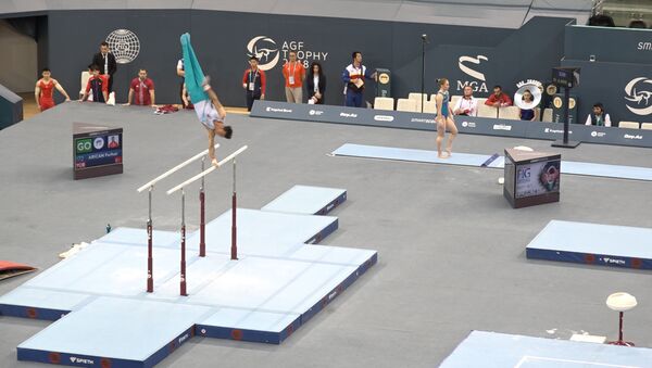 Кубок мира: в Баку парят в воздухе гимнасты 25 стран - Sputnik Азербайджан