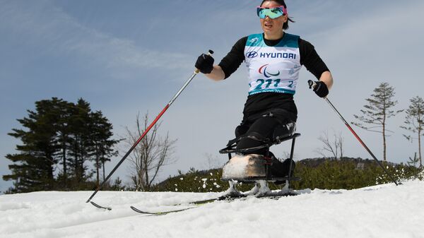 Российская биатлонистка и лыжница Марта Зайнуллина в ходе XII зимних Паралимпийских игр в Пхенчхане, 17 марта 2018 года - Sputnik Азербайджан