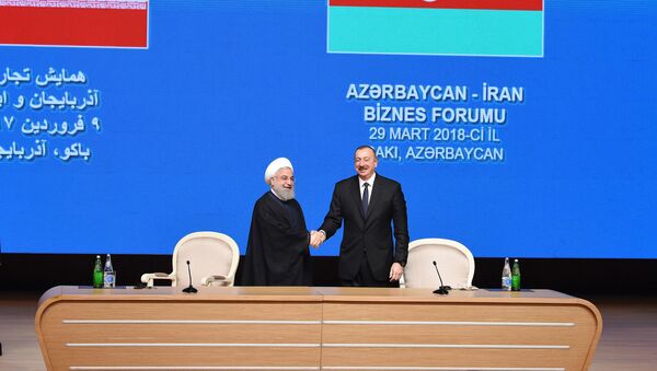 Президент Азербайджанской Республики Ильхам Алиев и Президент Исламской Республики Иран Хасан Роухани - Sputnik Азербайджан
