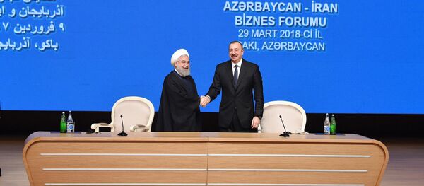 Президент Азербайджанской Республики Ильхам Алиев и Президент Исламской Республики Иран Хасан Роухани Президент Азербайджанской Республики Ильхам Алиев и Президент Исламской Республики Иран Хасан Роухани - Sputnik Азербайджан