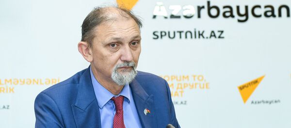 Израильский политолог Юрий Бочаров Израильский политолог Юрий Бочаров - Sputnik Азербайджан