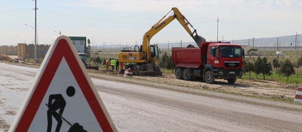 Cтроительство новой дороги M-1 Баку-Губа-граница с Российской Федерацией Cтроительство новой дороги M-1 Баку-Губа-граница с Российской Федерацией - Sputnik Азербайджан