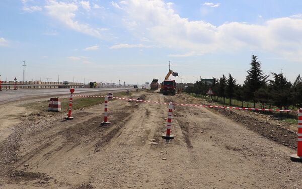 Cтроительство новой дороги M-1 Баку-Губа-граница с Российской Федерацией - Sputnik Азербайджан