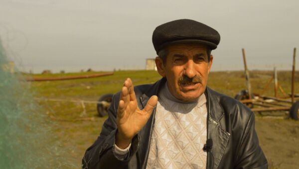 Азербайджанский рыбак похвастался своим уловом - Sputnik Азербайджан