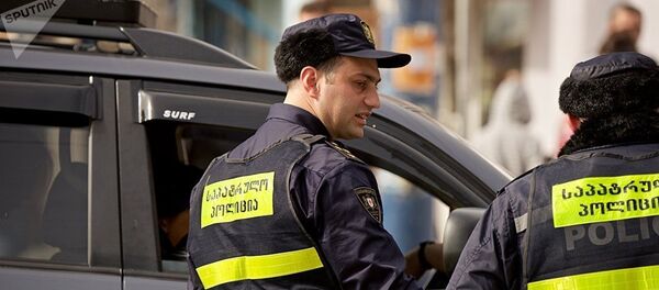 Сотрудники патрульной полиции в Тбилиси, фото из архива Сотрудники патрульной полиции в Тбилиси, фото из архива - Sputnik Азербайджан