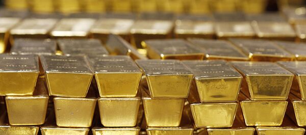 Золотые слитки, фото из архива Золотые слитки, фото из архива - Sputnik Азербайджан