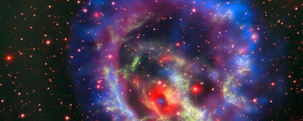 Остатки сверхновой 1E 0102.2-7219, расположенной в ближайшей к нам галактике Малое Магелланово Облако - Sputnik Азербайджан