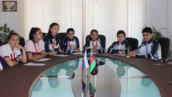 В РИКЦ прошла встреча с юными спортсменами из Азербайджана, которые приняли участие в IV Всемирных играх юных соотечественников в Казани - Sputnik Азербайджан