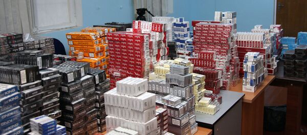 Партия табачной продукции без акцизной марки, конфискованная сотрудниками Министерства налогов Азербайджана Партия табачной продукции без акцизной марки, конфискованная сотрудниками Министерства налогов Азербайджана - Sputnik Азербайджан