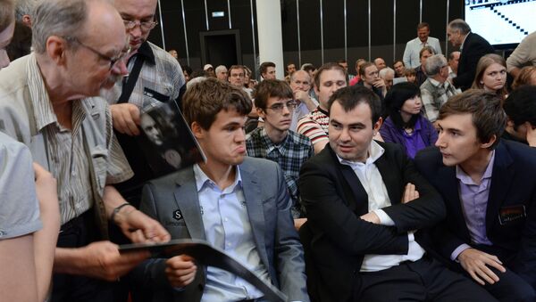 Российский шахматист Сергей Карякин, азербайджанский шахматист Шахрияр Мамедьяров и норвежский шахматист Магнус Карлсен (справа налево) - Sputnik Азербайджан