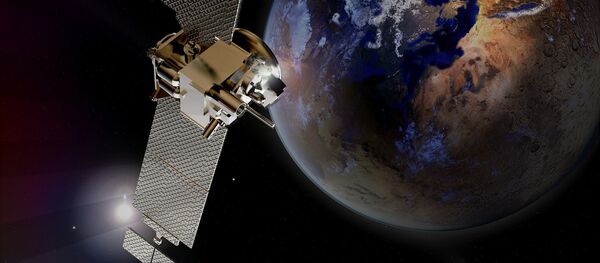 Спутник на земной орбите, фото из архива - Sputnik Азербайджан