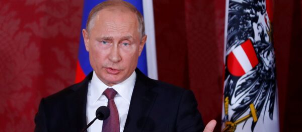 Президент РФ Владимир Путин в ходе пресс-конференции в Вене, Австрия, 5 июня 2018 года - Sputnik Азербайджан