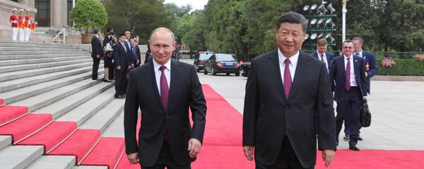 Президент РФ Владимир Путин и председатель КНР Си Цзиньпин во время встречи в Пекине - Sputnik Азербайджан