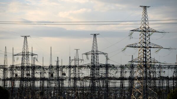 Электрические вышки на территории АЭС, фото из архива - Sputnik Азербайджан