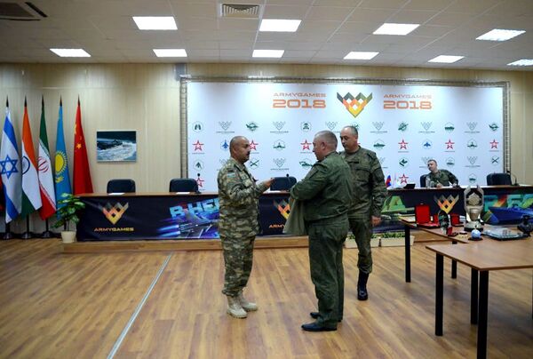 Состоялась жеребьевка команд конкурса «Танковый биатлон» Состоялась жеребьевка команд конкурса «Танковый биатлон» - Sputnik Азербайджан