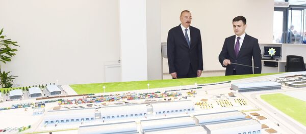 Президент Ильхам Алиев принял участие в открытии Абшеронского логистического центра Президент Ильхам Алиев принял участие в открытии Абшеронского логистического центра - Sputnik Азербайджан