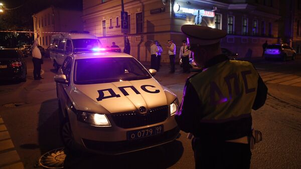 Неизвестный открыл огонь по полицейским в центре Москвы - Sputnik Azərbaycan
