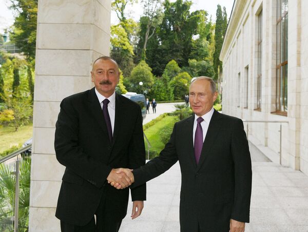Президенты Азербайджана и РФ Ильхам Алиев и Владимир Путин во время встречи. Сочи, резиденция Бочаров Ручей, 1 сентября 2018 года  - Sputnik Азербайджан