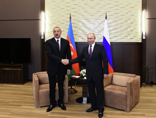 Президенты Азербайджана и РФ Ильхам Алиев и Владимир Путин во время встречи. Сочи, резиденция Бочаров Ручей, 1 сентября 2018 года Президенты Азербайджана и РФ Ильхам Алиев и Владимир Путин во время встречи. Сочи, резиденция Бочаров Ручей, 1 сентября 2018 года - Sputnik Азербайджан