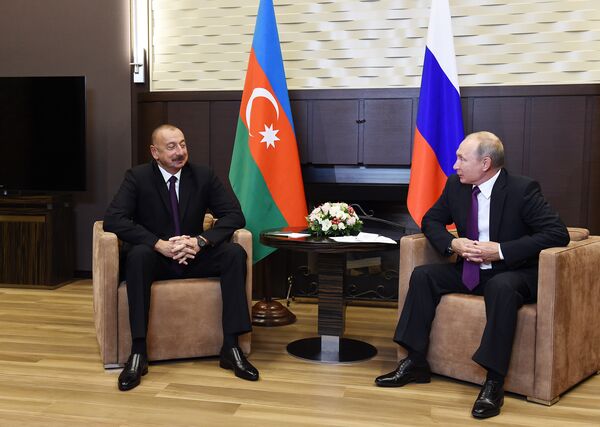 Президенты Азербайджана и РФ Ильхам Алиев и Владимир Путин во время встречи. Сочи, резиденция Бочаров Ручей, 1 сентября 2018 года Президенты Азербайджана и РФ Ильхам Алиев и Владимир Путин во время встречи. Сочи, резиденция Бочаров Ручей, 1 сентября 2018 года - Sputnik Азербайджан
