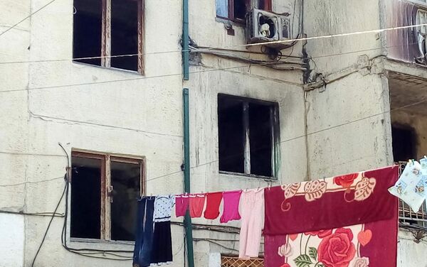 Пожар в жилом доме в городе Мингячевир. 12 сентября 2018 года - Sputnik Азербайджан