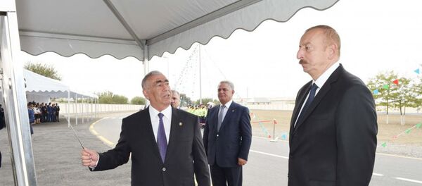Президент Ильхам Алиев принял участие в открытии автомобильной дороги Зехметабад-Бейдели-Хырмандалы-Алиабад Билясуварского района Президент Ильхам Алиев принял участие в открытии автомобильной дороги Зехметабад-Бейдели-Хырмандалы-Алиабад Билясуварского района - Sputnik Азербайджан