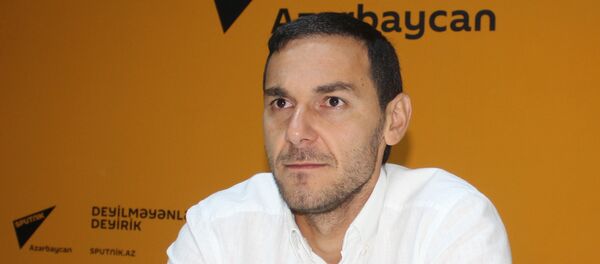 Вратарь национальной сборной Азербайджана по футболу Кямран Агаев Вратарь национальной сборной Азербайджана по футболу Кямран Агаев - Sputnik Азербайджан