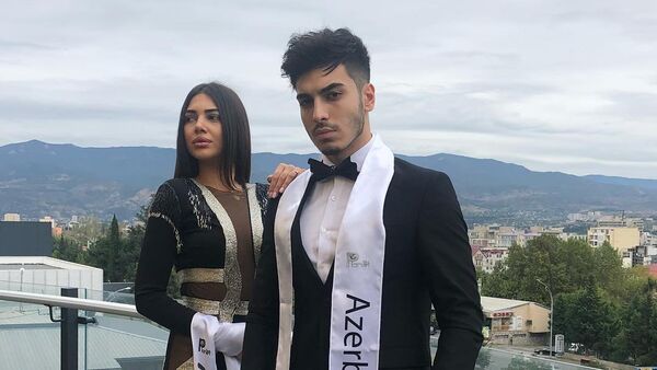 Azərbaycanlı modellər Emil Qasımov və Züleyxa Orucova Tbilisidə keçirilən Miss & Mister Planet-2018 beynəlxalq gözəllik yarışmasında - Sputnik Azərbaycan