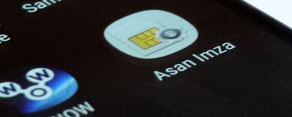 Значок ASAN Imza на экране смартфона Значок ASAN Imza на экране смартфона - Sputnik Азербайджан
