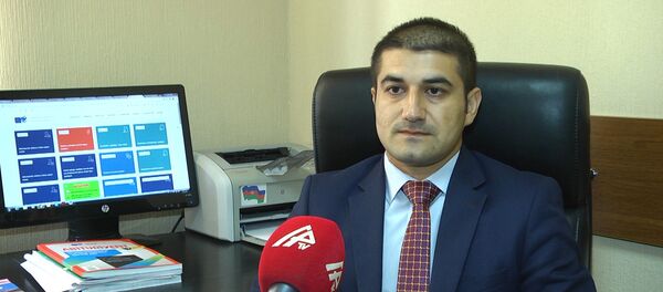 Заведующий сектором по работе с прессой и электронными коммуникациями Государственного экзаменационного центра (ГЭЦ) Ханлар Ханларзаде - Sputnik Азербайджан