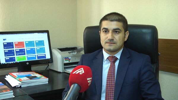 Заведующий сектором по работе с прессой и электронными коммуникациями Государственного экзаменационного центра (ГЭЦ) Ханлар Ханларзаде - Sputnik Азербайджан