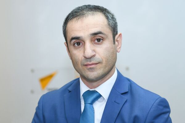 Вице-президент Центра экономических исследований и обучения Радиль Фатуллаев - Sputnik Азербайджан