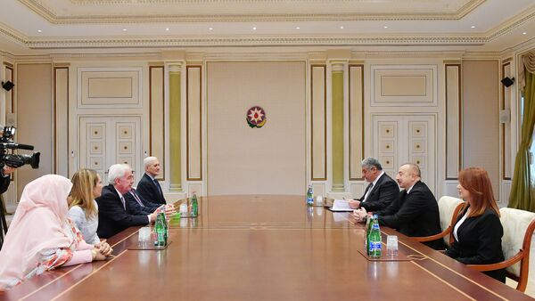Президент Азербайджана Ильхам Алиев на встрече с делегацией, возглавляемой президентом Всемирного антидопингового агентства Крейгом Риди - Sputnik Азербайджан