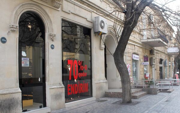 70% скидки в городском магазине одежды - Sputnik Азербайджан
