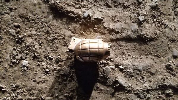 Неразорвавшийся боеприпас на территории Низаминского района города Баку - Sputnik Азербайджан