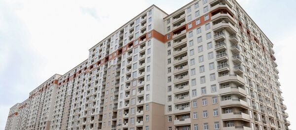 Семьи шехидов, инвалиды Карабахской войны и 20 января сегодня получили 145 квартир в новых зданиях жилого комплекса Göy qurşağı - Sputnik Азербайджан