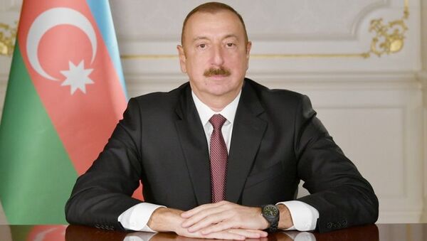 Президент Ильхам Алиев поздравил азербайджанский народ по случаю Дня солидарности азербайджанцев мира и Нового года - Sputnik Азербайджан