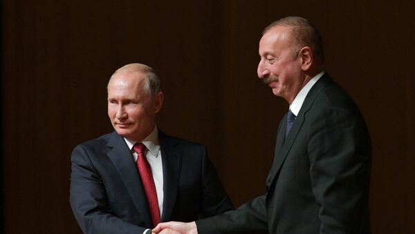 Президент РФ Владимир Путин и президент Азербайджана Ильхам Алиев во время встречи - Sputnik Азербайджан