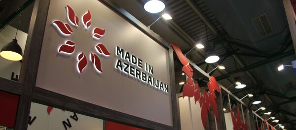 Под слоганом Made in Azerbaijan проходит международная продуктовая выставка Продэкспо-2019 в Москве - Sputnik Азербайджан